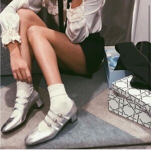 Silver KINA carel paris 39